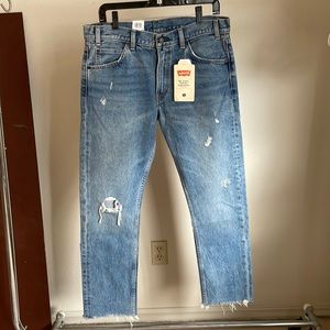 Levi’s 505 Cropped with orange tab.